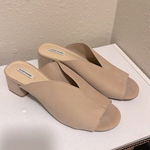 Worn once. Pale peach-tan/neutral color.